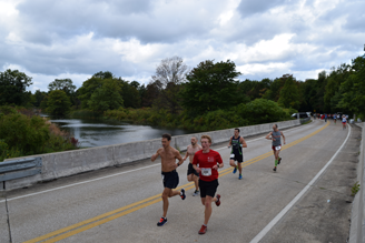 Erie Marathon Runners head east along the bayside of the course.