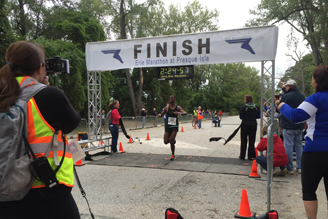 The Winner of the Erie Marathon crosses the finish line and qualifies for Boston Marathon.